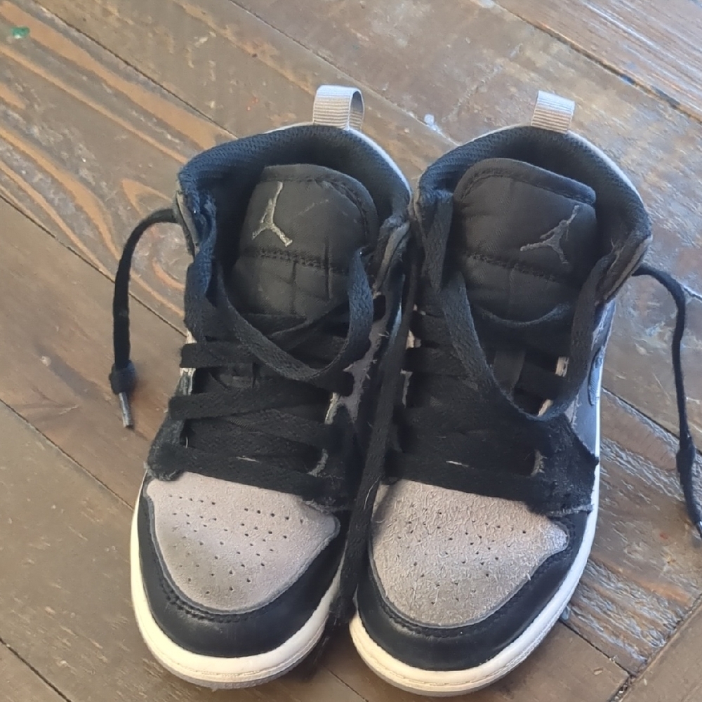 Nike Air Jordan Black and Gray Sneakers with High-Top Design